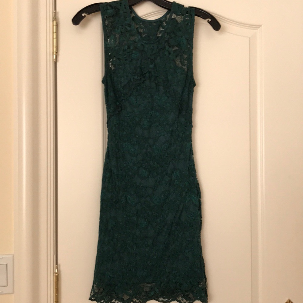 Gilber Gilmore green lace dress with open back